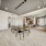 The leasing office McDowell Point apartments in Naperville, IL, featuring carpeted flooring with desks and chairs.