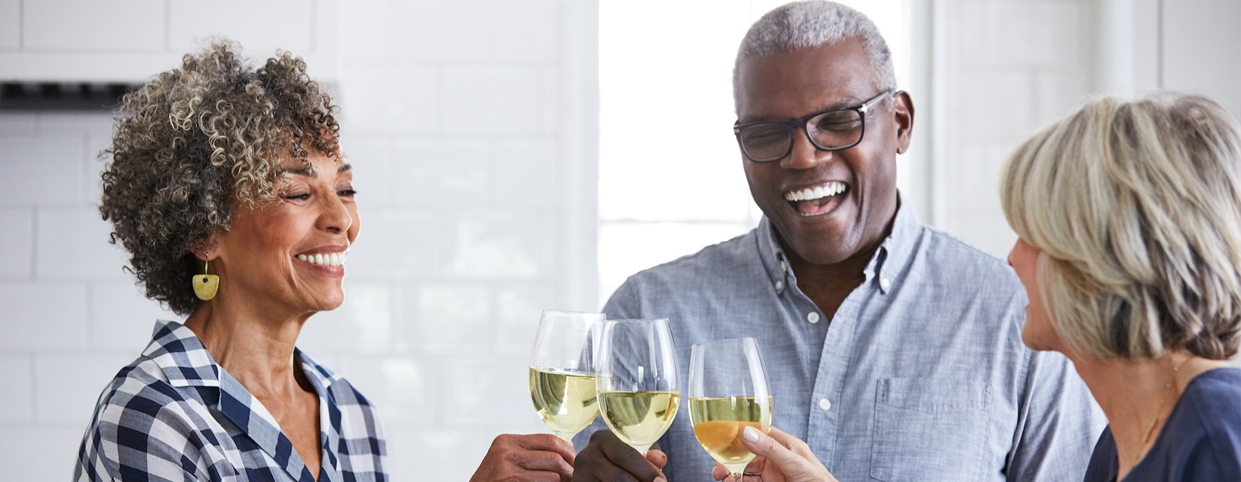 friends hanging out enjoying a glass of wine