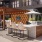 Outdoor lounge at McDowell Point apartments in Naperville, IL, featuring grill stations and outdoor furniture.